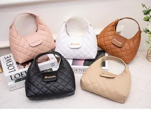 Detailed display of five colorful quilted crossbody bags with gold logo and shoulder straps