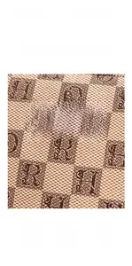 Detailed view of brown letter pattern fabric with waterproof and scratch-resistant features