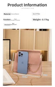Pink crossbody bag with chain strap and metal ring detail, size 21x7x14cm display