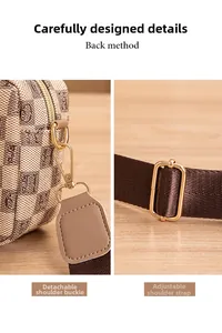 Detail of detachable gold-tone hooks and adjustable woven strap on monogram camera bag