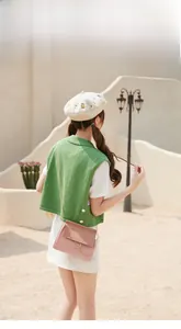 Chic pink color-block crossbody bag with metal ring handle and chain strap for women