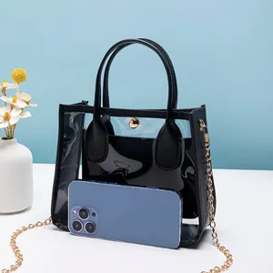 Borsa a tracolla trasparente in PVC da donna con finiture in pelle e catena dorata