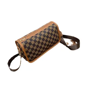 Checkerboard pattern cylindrical Boston bag with gold S-letter logo and adjustable strap