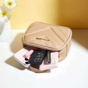 Quilted beige PU leather crossbody bag with V-pattern stitching and gold metal logo