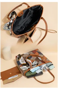 Detail view of large tote bag interior showing magnetic closure and storage capacity