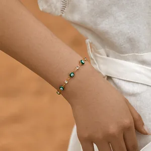 Handmade 18K gold plated bracelet with green evil eye beads and sparkling crystals