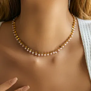 Bohemian style beaded choker necklace with 18K gold plated discs and pink beads