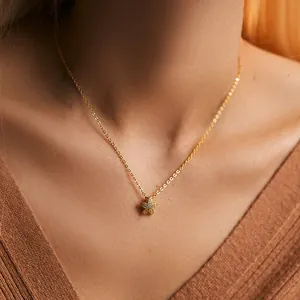 Detailed close-up of a 18K gold-plated starfish pendant necklace with sparkling zircons