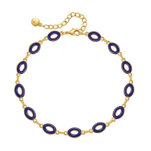 Bracciale dorato con ciondoli in smalto blu scuro e chiusura a moschettone regolabile