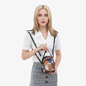 Mini sac à dos coloré pour femme avec motifs géométriques et ornement d'abeille en métal
