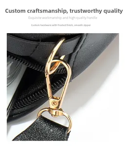 Detail of high-quality gold metal hook and textured leather strap on the crossbody bag
