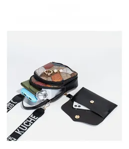 Internal view of crossbody bag showing large capacity for phone and water bottle