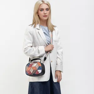 Retro patchwork crossbody bag with geometric embroidery and wide ethnic shoulder strap