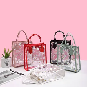 Women's Clear Daisy Print Handbag PVC Transparent Crossbody Bag With Gold Chain Strap Casual Stylish Tote Purse For Travel Daily Use