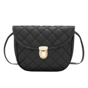 Classic black quilted leather saddle crossbody bag with golden metal buckle for women