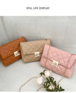 Three quilted shoulder bags in brown, beige, and pink with gold square locks and chains