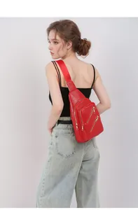 Fashionable red faux leather crossbody chest bag for women with golden zipper detail