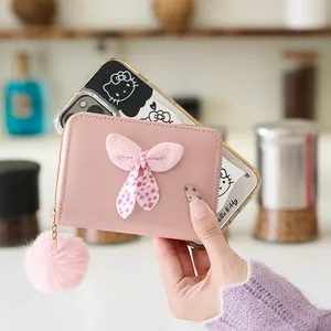 Portefeuille court rose avec nœud à pois et pompon décoratif pour femme tendance