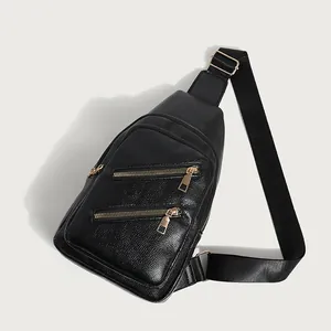 Fashionable black pebbled PU leather chest bag with golden zippers and wide strap