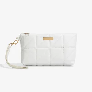 Mini white quilted ladies bag with gold zipper and detachable wrist strap