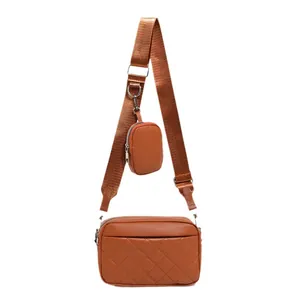 Caramel quilted crossbody camera bag set with wide shoulder strap and round coin purse