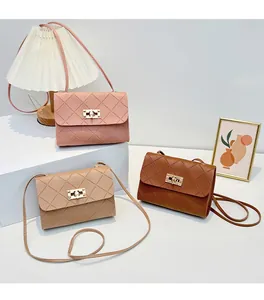 Detailed view of quilted faux leather crossbody bags with gold rotating lock in three colors
