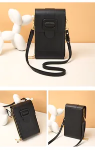 Détails du mini sac bandoulière noir pour téléphone avec fermetures éclair dorées