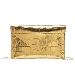 Fashionable gold crocodile pattern crossbody envelope bag with metallic chain strap for women