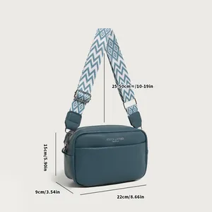 Blue-grey lychee pattern crossbody bag for women with 22cm length and wide strap