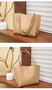 Vues détaillées d'un grand sac cabas kaki avec une texture en similicuir lisse