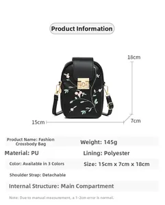 Detail view of small black PU bag with floral embroidery and size specs 15x7x18cm