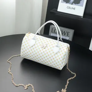 White Boston bag with gold geometric print, butterfly ornament and chain strap