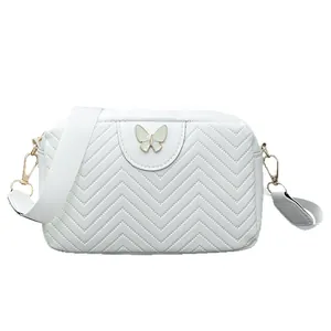 White chevron quilted crossbody bag for women with butterfly clasp and woven strap