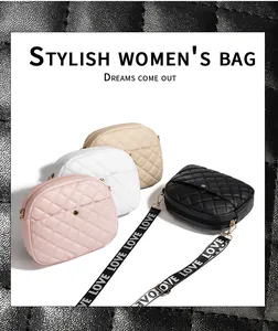 Close-up of quilted PU leather mini bags with LOVE letter wide straps and gold zippers