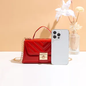Glossy red V-quilted small handbag with gold square lock and chain strap for women