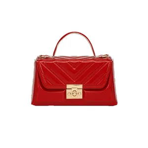 Glossy red V-quilted faux leather crossbody bag with golden square lock and chain