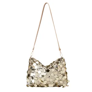 Sparkly gold sequin shoulder bag for women with metallic texture and slim strap