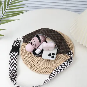Vintage letter print crossbody chest bag with geometric strap and interior essentials