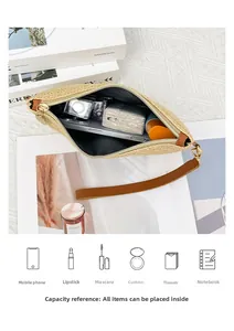 Vista interna della pochette in paglia intrecciata con spazio per il trucco