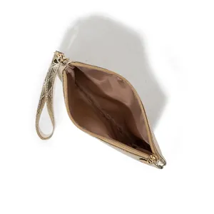Gold quilted wristlet clutch with metallic finish and spacious interior for smartphone