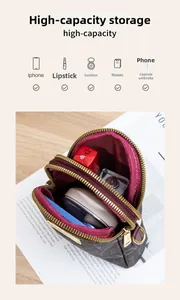 Detailed interior of a brown leather crossbody bag showing multiple storage compartments