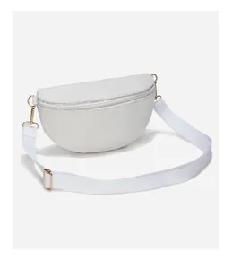 Close-up of white corduroy waist bag showing texture and golden metal buckle details