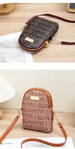 Detailed macro view of dual zipper compartments and luxury letter pattern on mini bags
