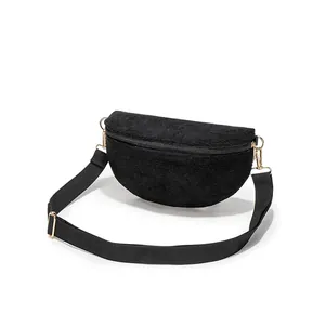 Fashionable black corduroy crossbody chest bag with adjustable strap and gold hardware