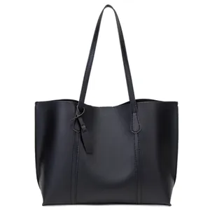 Classic large black soft leather tote bag for women with dual straps and minimalist design