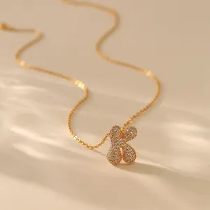 Elegant gold bubble letter K pendant necklace with pave crystals for women's daily wear