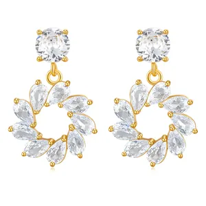 18K gold plated copper earrings with circular flower pendant and zircon inlay on white base