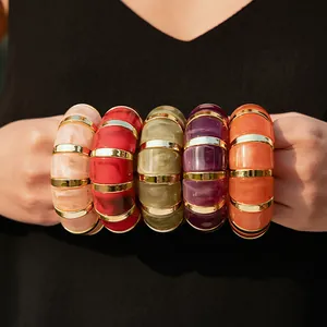 Bohemian acrylic resin bangle set with gold accents in pink red purple and green