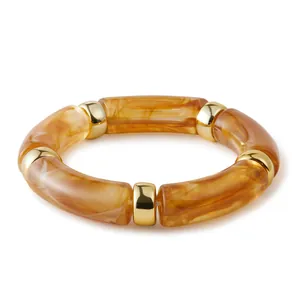 Bohemian acrylic elastic bracelet with amber marble texture and gold metal spacers