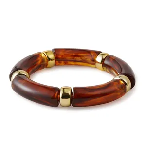 Bohemian elastic acrylic bracelet with dark brown tortoiseshell resin and gold metal beads